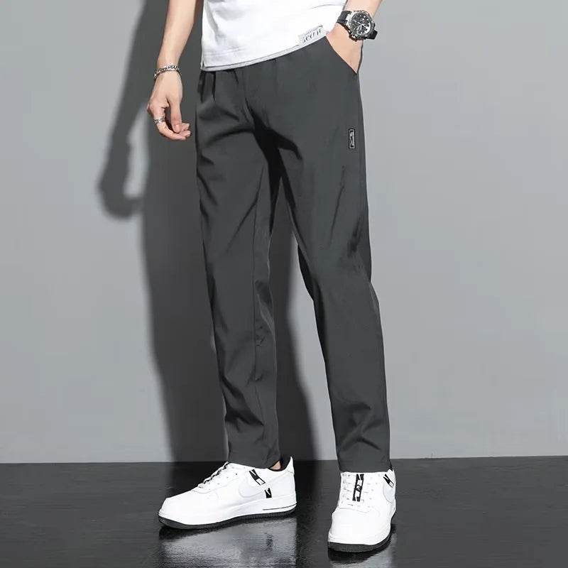 2025 summer new casual men's long pants slim fit and fashionable ice silk straight leg pants men's jogging fast drying sports