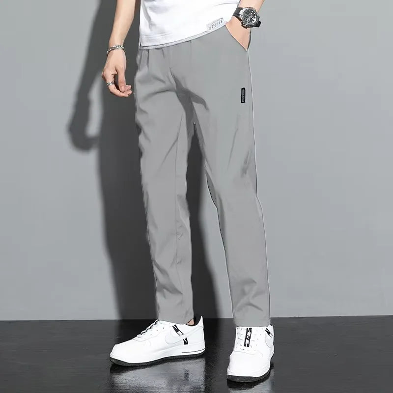 2025 summer new casual men's long pants slim fit and fashionable ice silk straight leg pants men's jogging fast drying sports