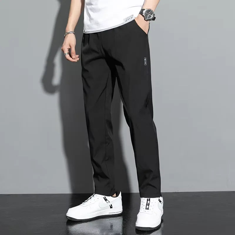 2025 summer new casual men's long pants slim fit and fashionable ice silk straight leg pants men's jogging fast drying sports